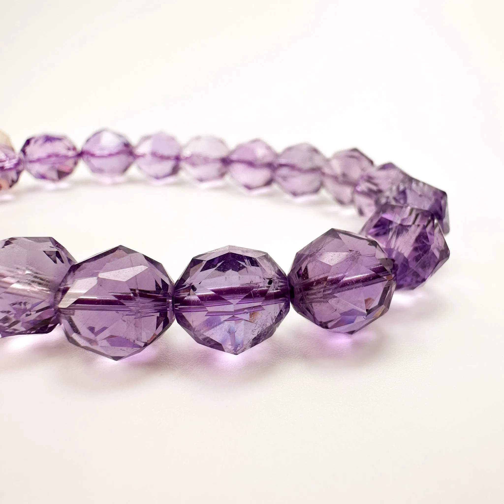 Amethyst 10mm Faceted Star Cut Stretchy Cord Bracelet (J292)